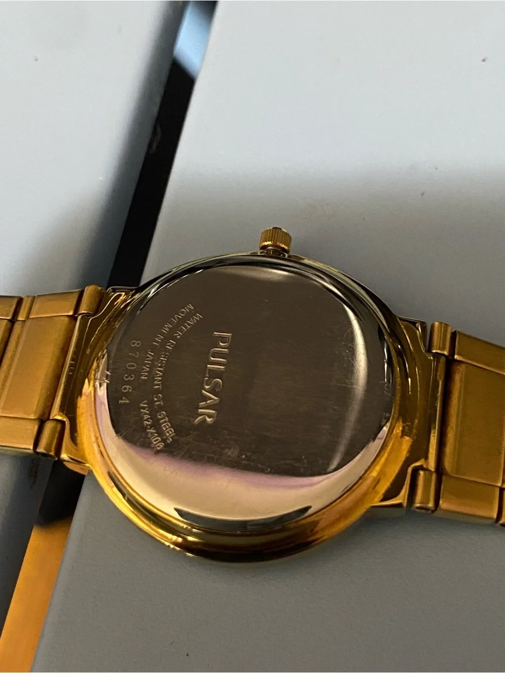 Pulsar Gold Watch Gold watch with gold dial, gold bracelet, and gold